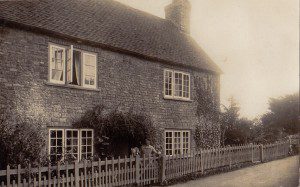 Milly Spooner with Brusher outside Kosy Cottage (now part of Holliers)