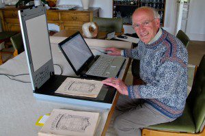 Tony Brooks scanning early editions of our parish magazine Outlook